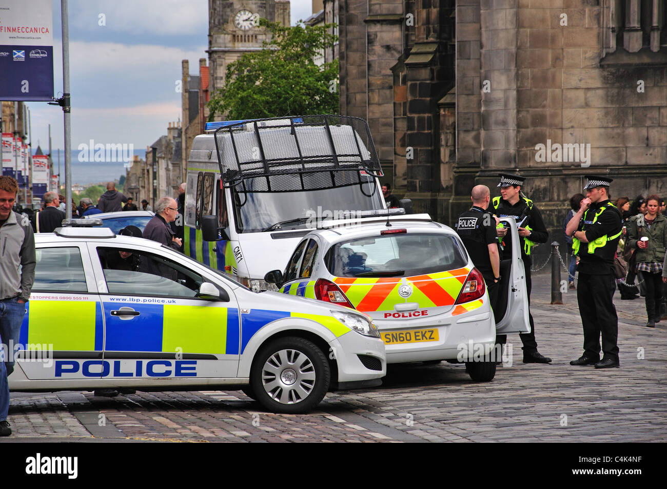 Police cars on call, Royal Mile, Old Town, Edinburgh, Lothian, Scotland, United Kingdom Stock Photo