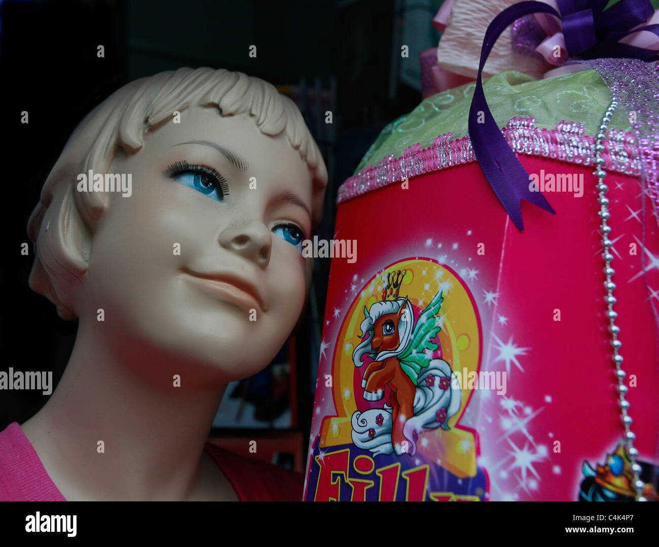 Creepy child mannequin in shop window Stock Photo - Alamy