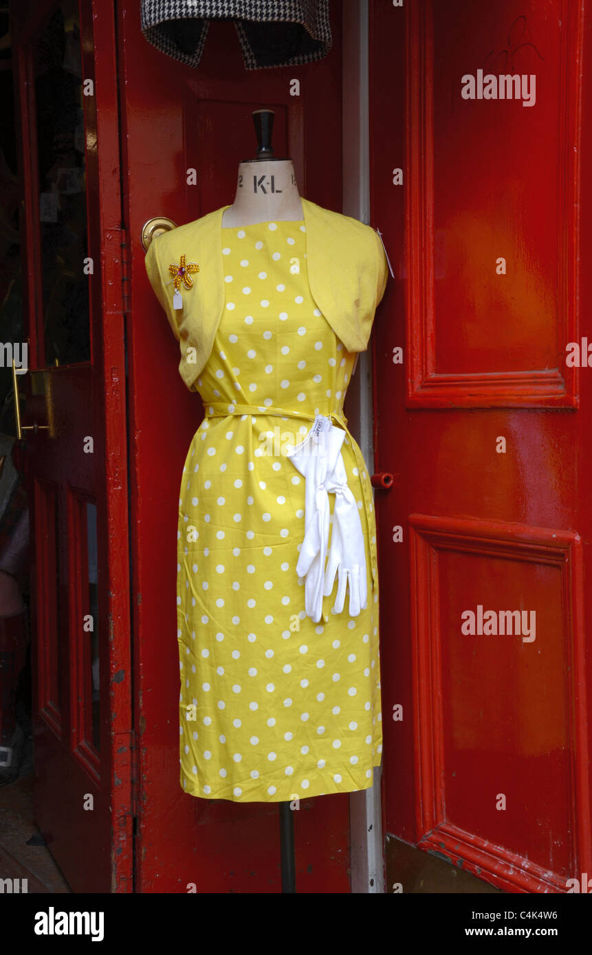 A vintage dress in  the doorway of a branch of Armstrong's vintage clothing store in Edinburgh, Scotland, UK. Stock Photo