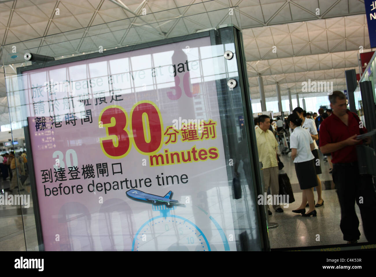 Departures concourse sign passengers chek lap kok Stock Photo