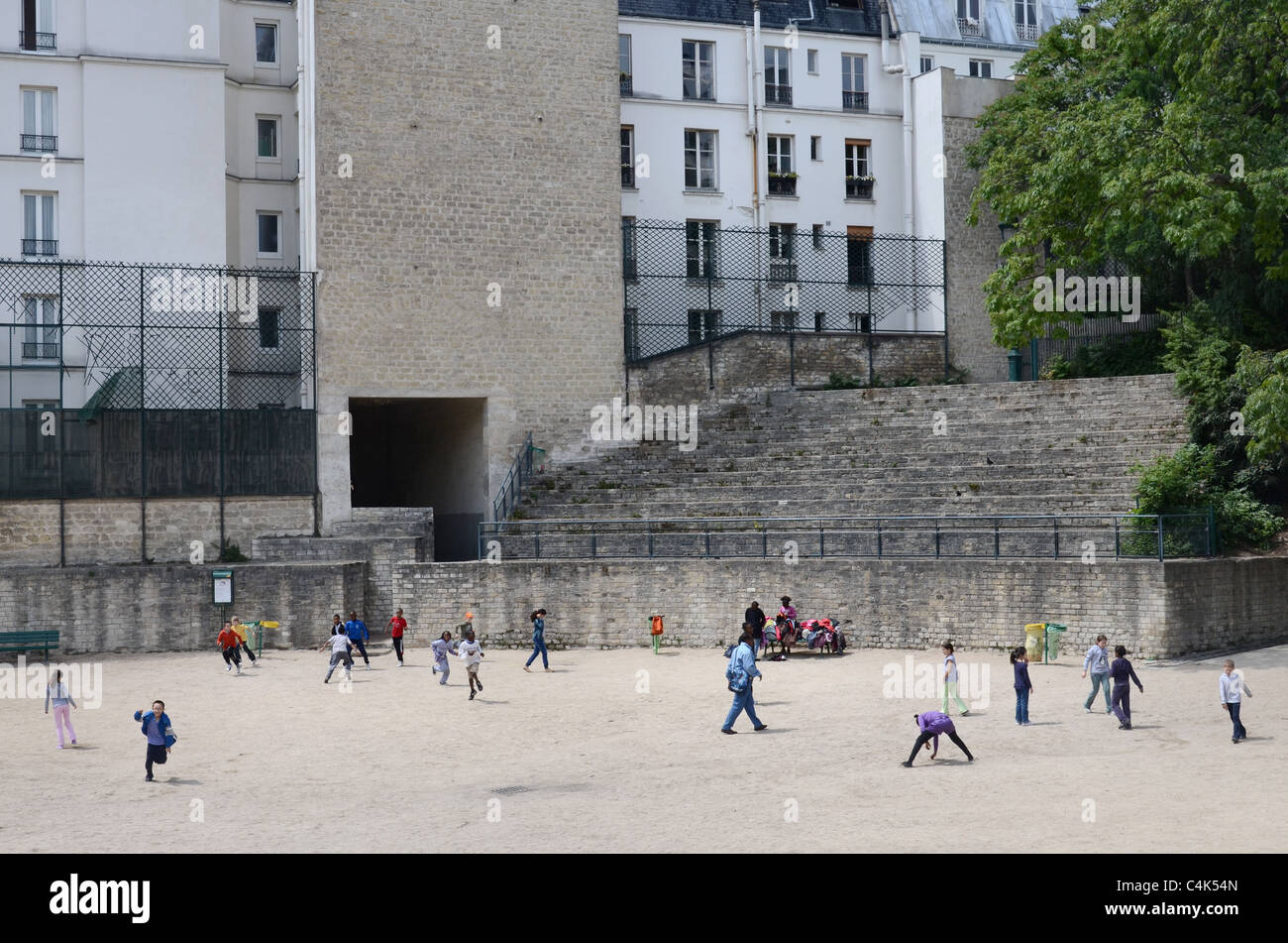 Amphitheater Paris Children playing in the Arenes de Lutece, a roman amphitheater in the ...