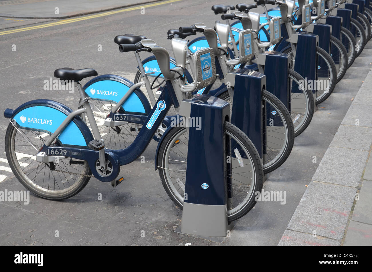 Barclays Transport for London Cycling scheme cycles in a bicycle rack