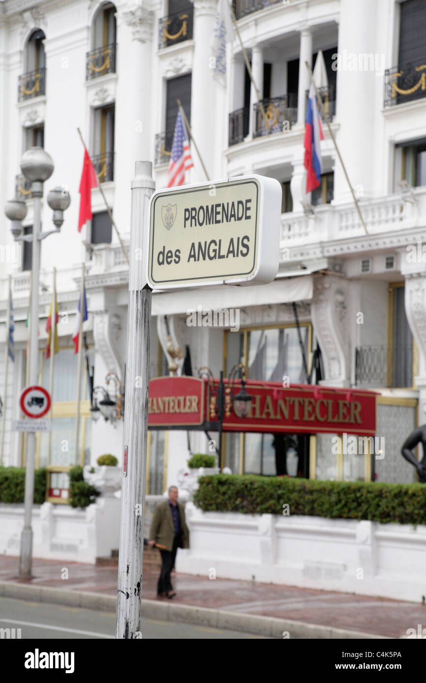 Street name sign opposite Art Deco Hotel Negresco on the Promenade des Anglais Nice France Stock Photo