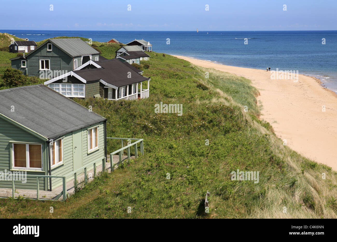 Beach houses at Low Newton, Embleton Bay, Northumberland, North East England, UK Stock Photo