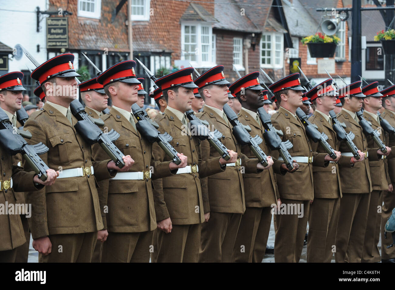 Troops from the Princess of Wales's regiment marching through Crawley in Sussex after returning from duty in Afghanistan Stock Photo