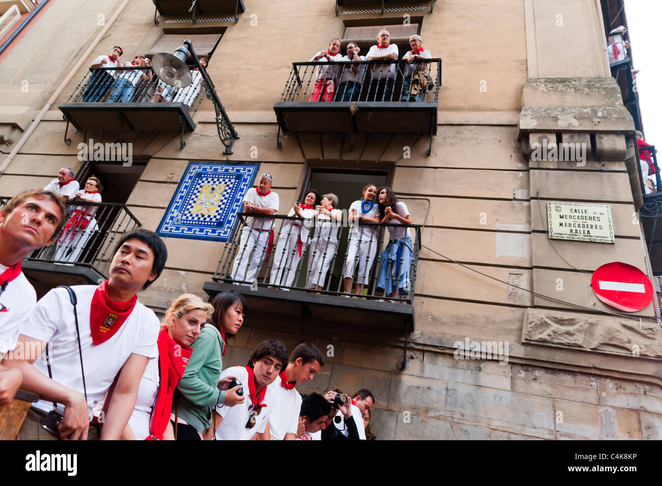 Spectators waiting for the bull-running, San Fermín street-partying, Pamplona, Navarra (Navarre), Spain, Europe. Stock Photo
