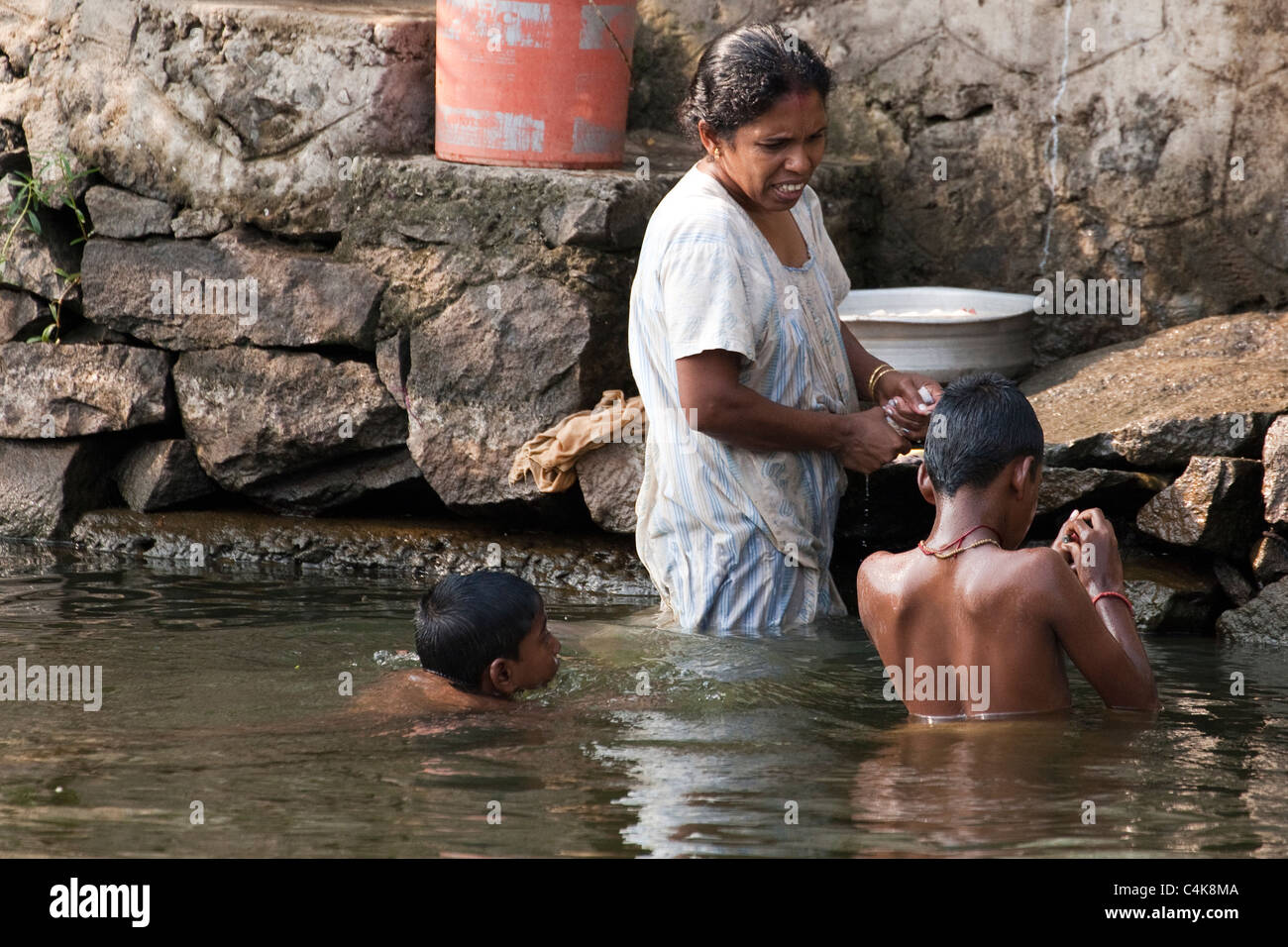 Bathing, backwaters of Alleppey (Alappuzha), Kerala, India Stock Photo