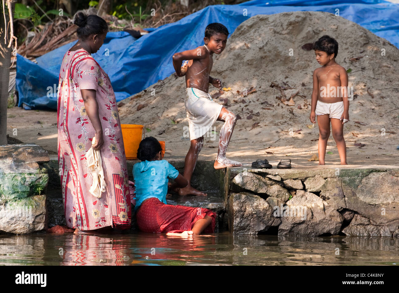 Bathing, backwaters of Alleppey (Alappuzha), Kerala, India Stock Photo
