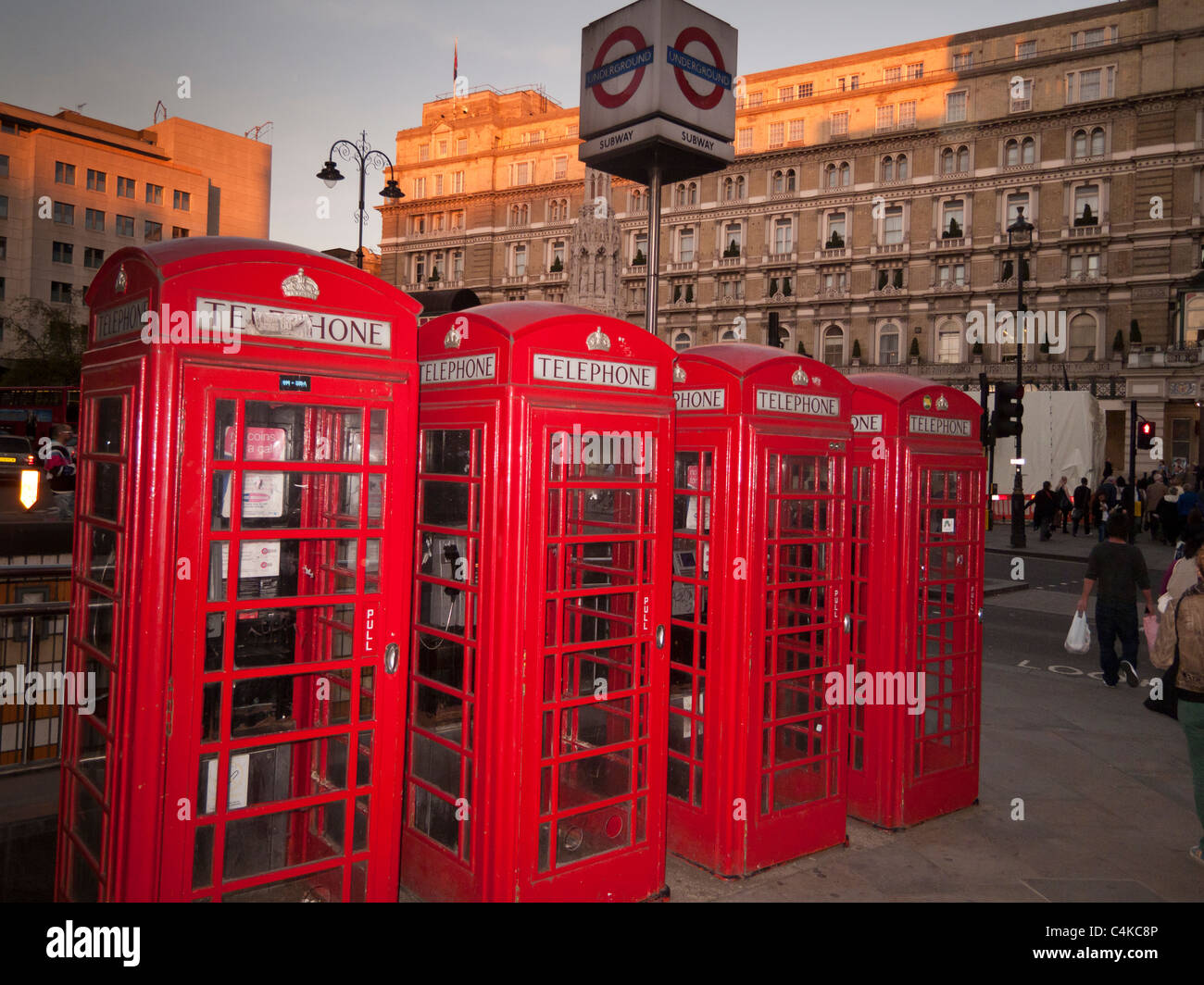 Red telephone boxes and The Charing Cross Hotel at the background