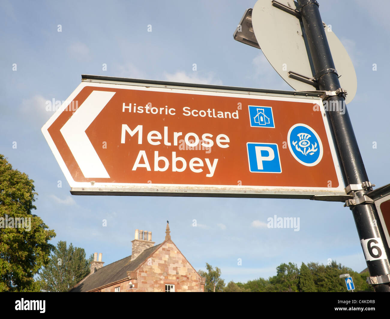 Tourist sign post in Melrose showing the way to the Abbey Stock Photo