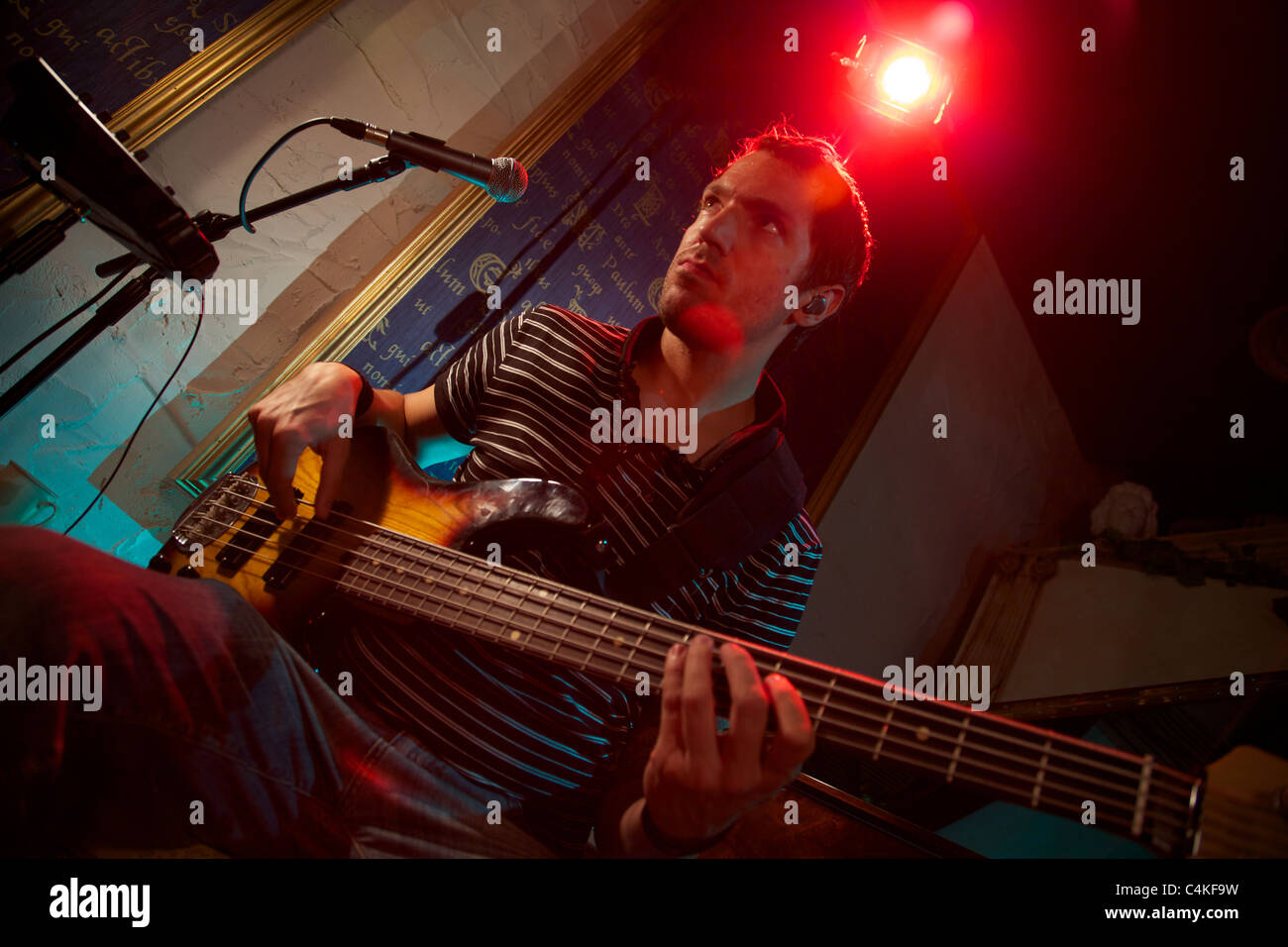 Vinzenz Benjamin, a session bass player, recording in a studio, for a CD, Sheffield, England Stock Photo