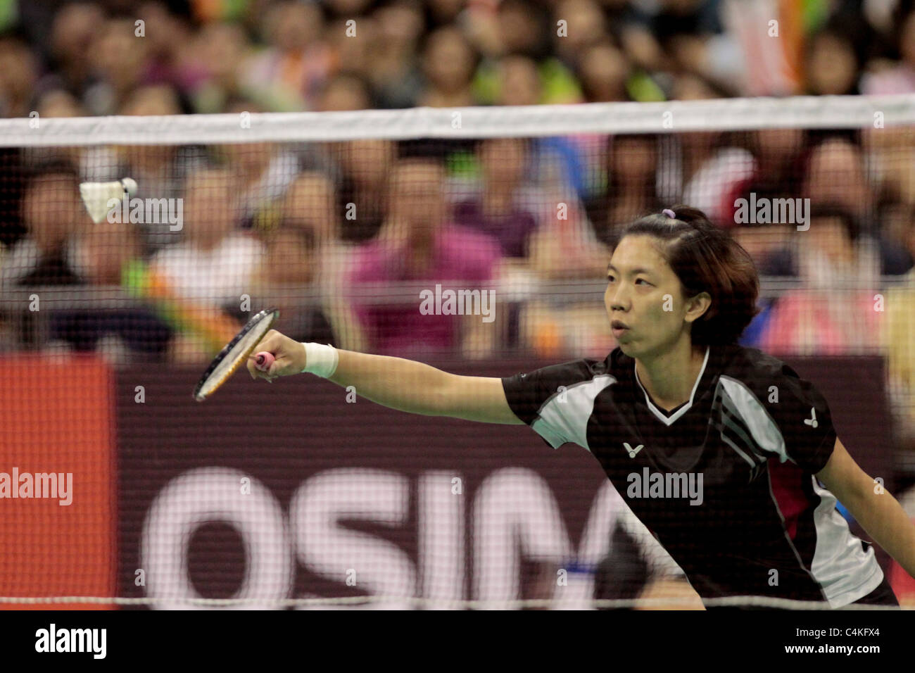 Cheng Wen Hsing of Chinese Taipei in action during their Mixed Double Finals in the Li-Ning Singapore Open 2011. Stock Photo
