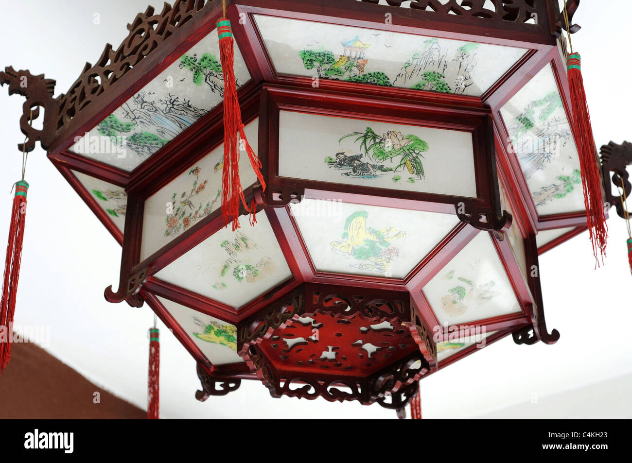 Traditional palace lantern of Chinese style hanging on the ceiling ...