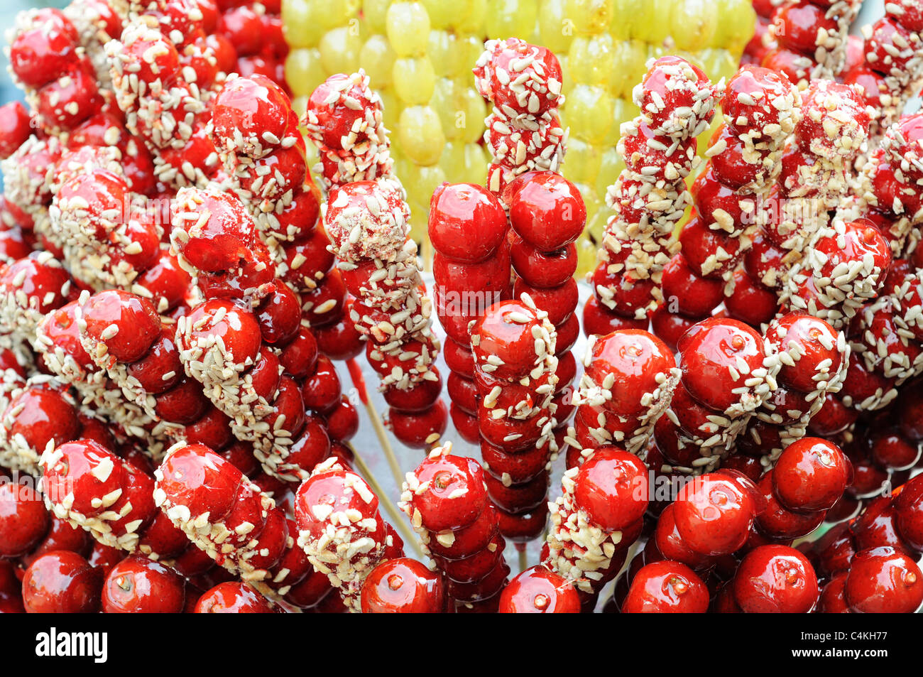 Traditional Chinese food,sugarcoated haws on a stick Stock Photo Alamy