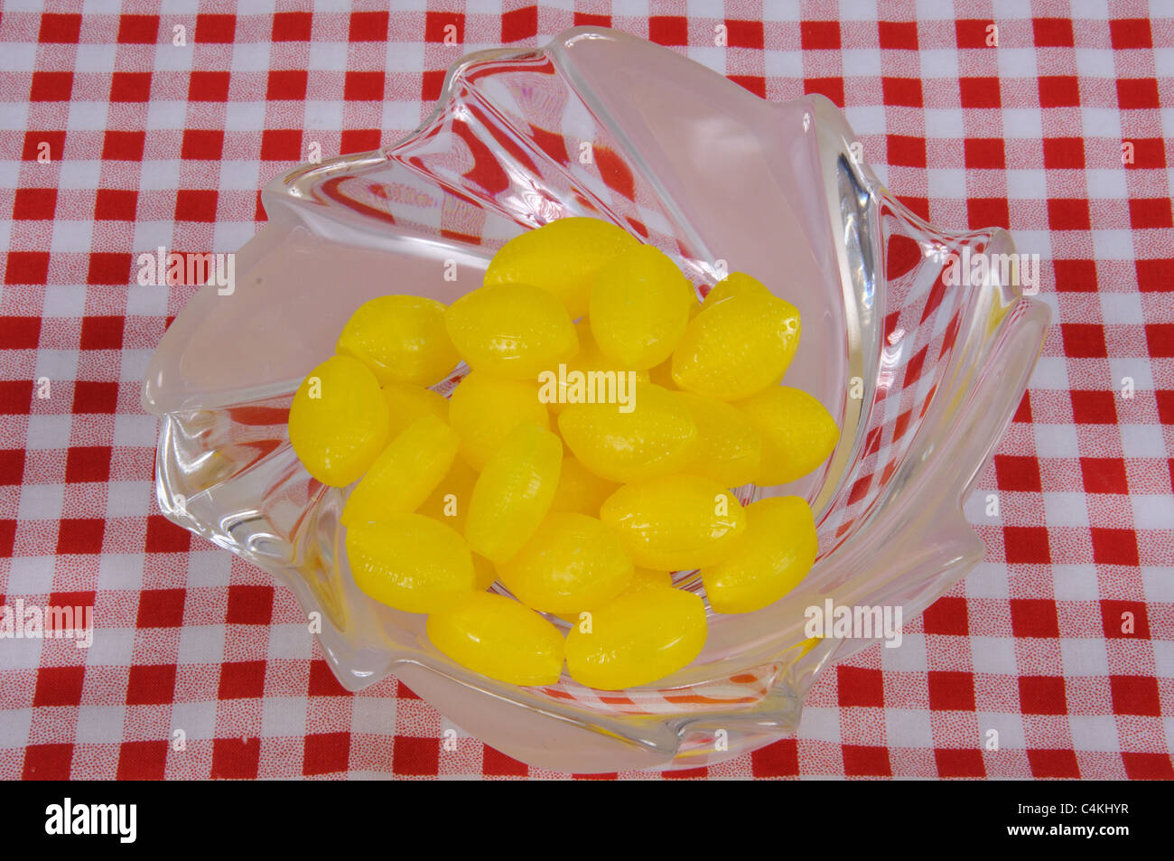 Glass dish with Sherbet Lemons, Urb. Calypso, Costa del Sol, Malaga Province, Andalucia, Spain, Western Europe. Stock Photo