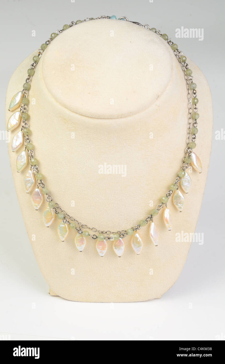 A necklace with shell on display Stock Photo