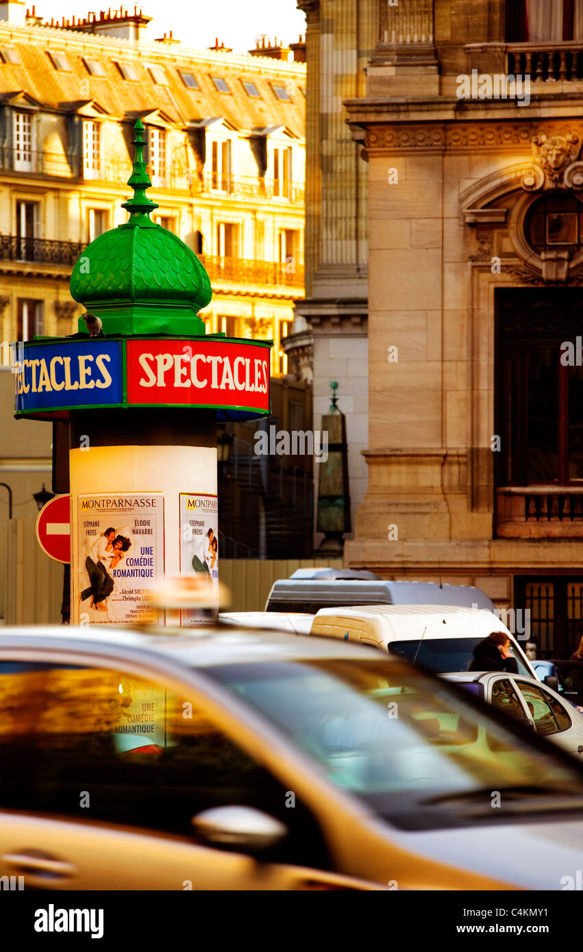 Street scene with kiosk and traffic, Paris, France, Europe Stock Photo