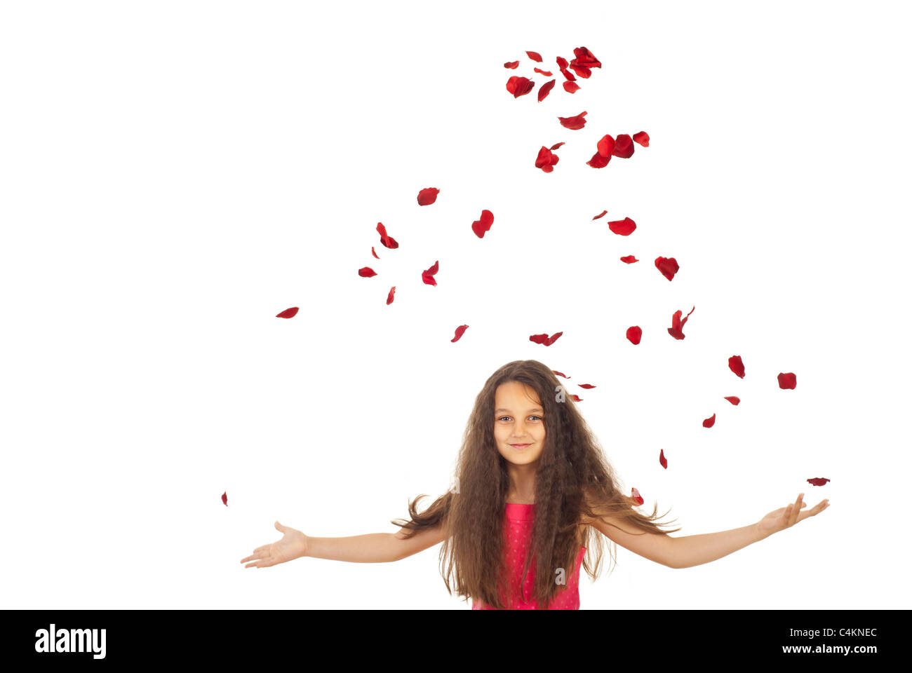 Beauty girl with flying roses petals isolated on white background Stock ...