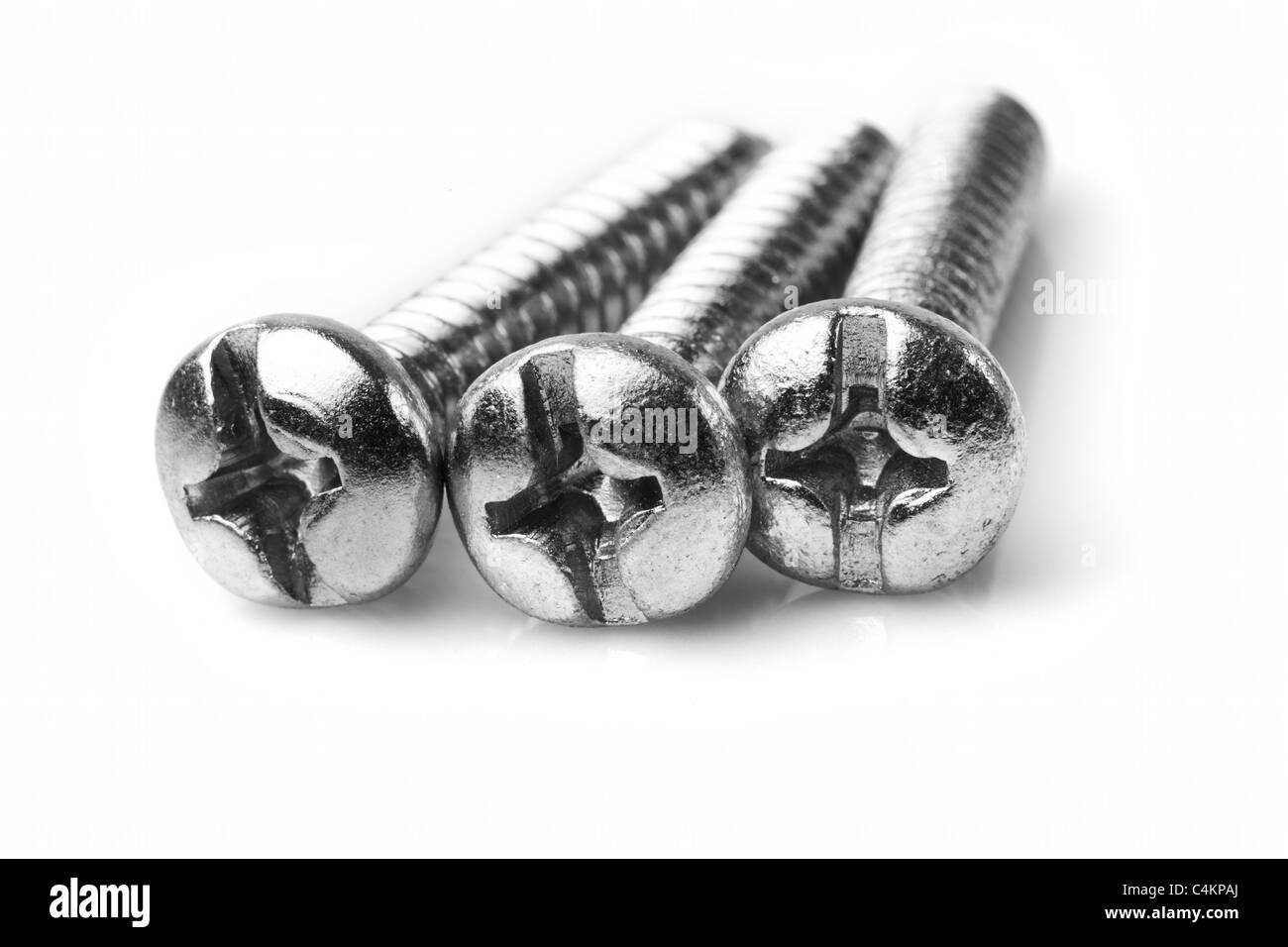 Three Philips Head Screws Or Cross Head Screws Isolated On White Studio