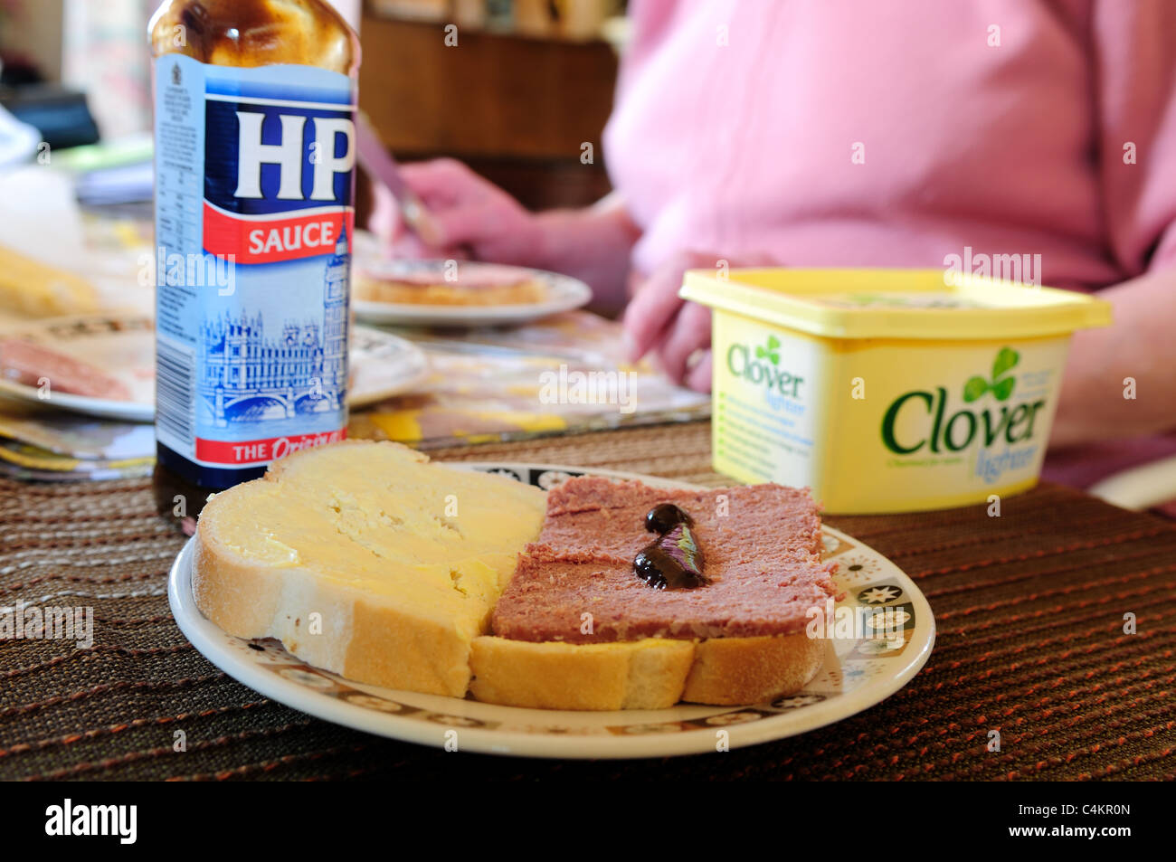 Corned Beef Sandwich and HP Sauce made by Elderly Person Stock Photo
