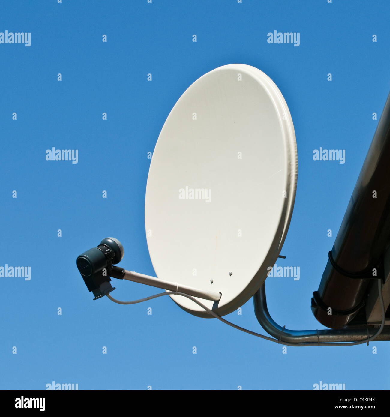 A close up of a round satellite dish and LNB Stock Photo