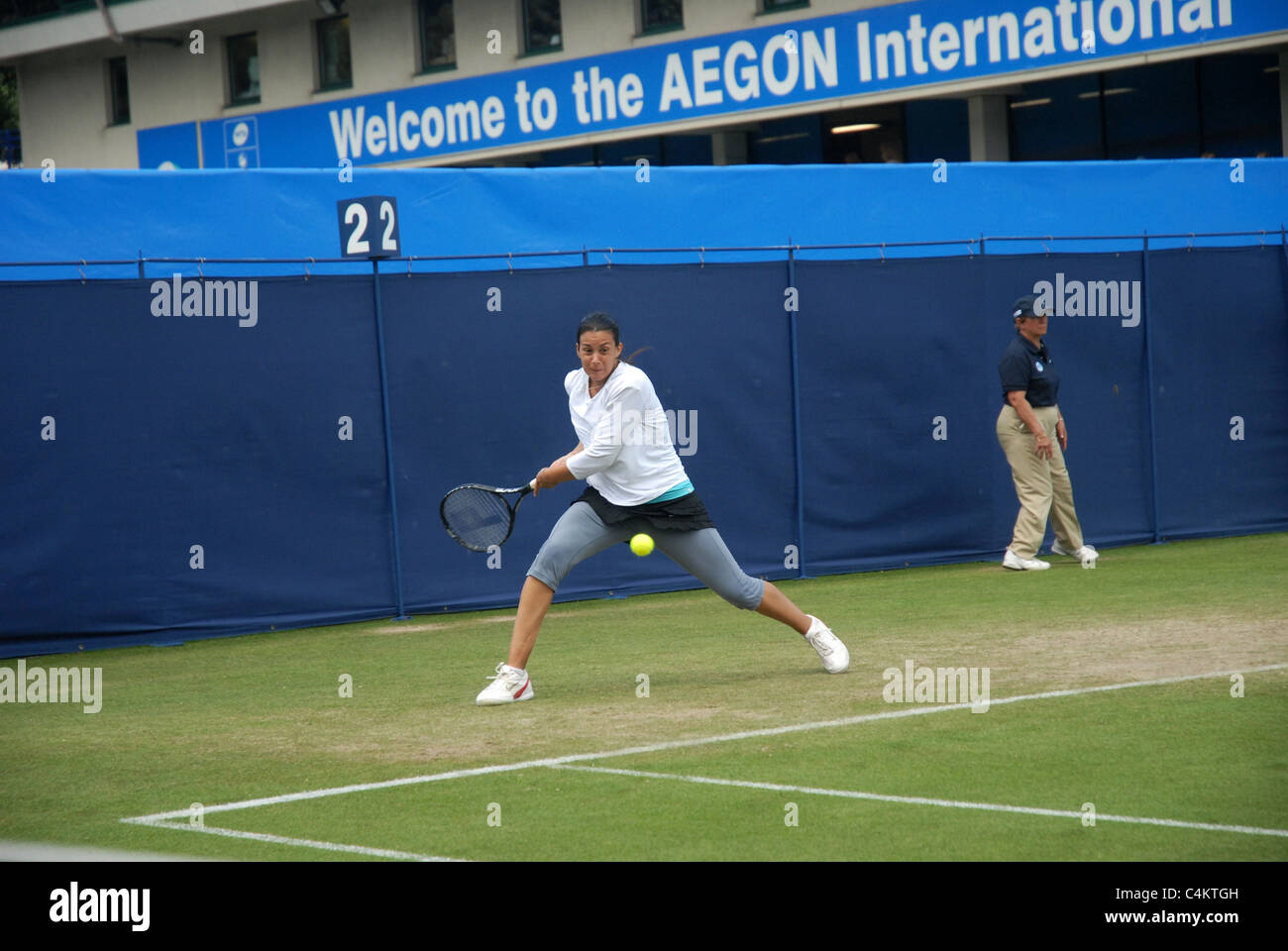 Marion Bartoli playing tennis at the Aegon International Tournament