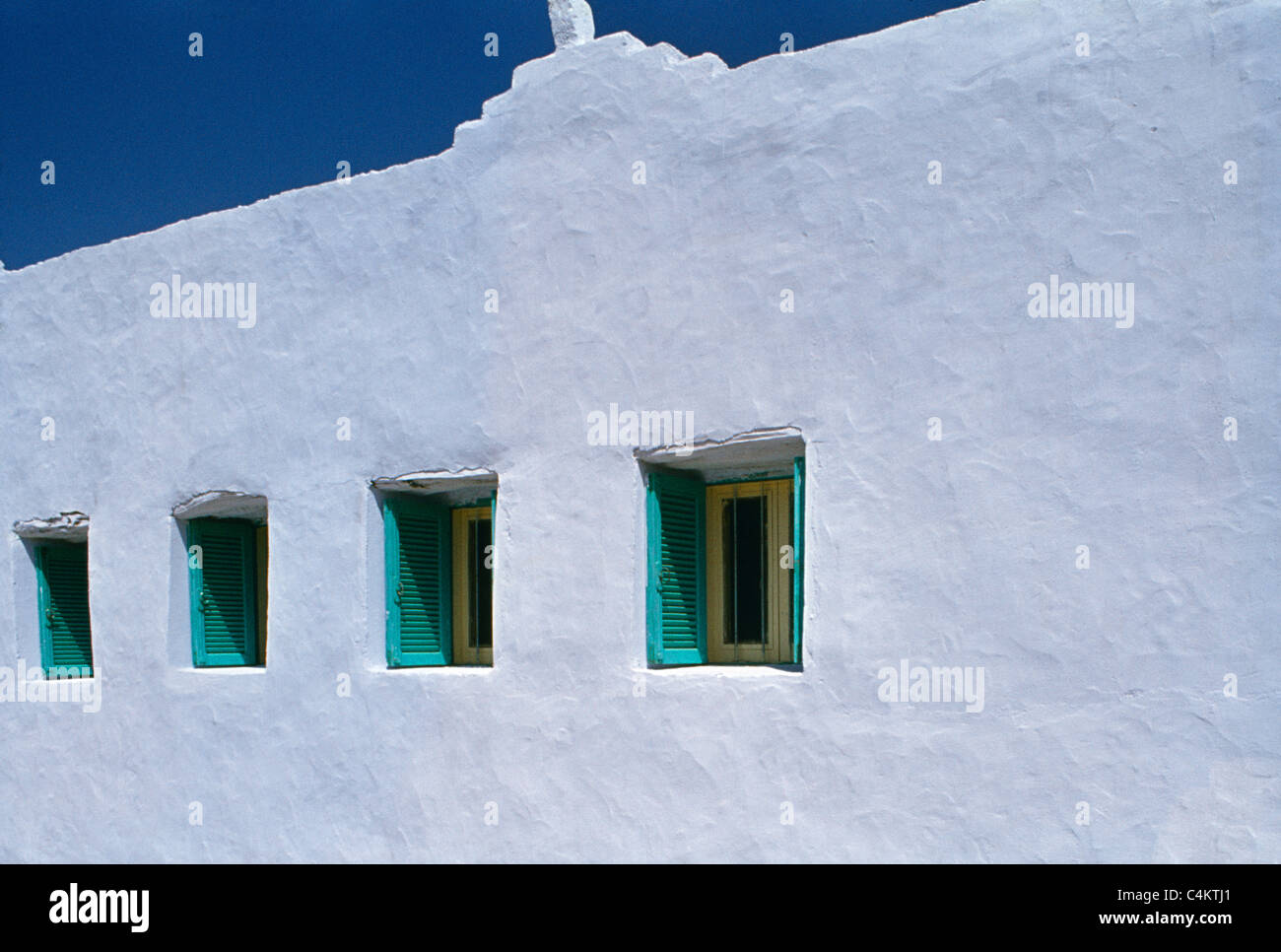 Nr Abha Asir Saudi Arabia Farm House Close Up showing thick Walls and small Windows & Shutters Stock Photo