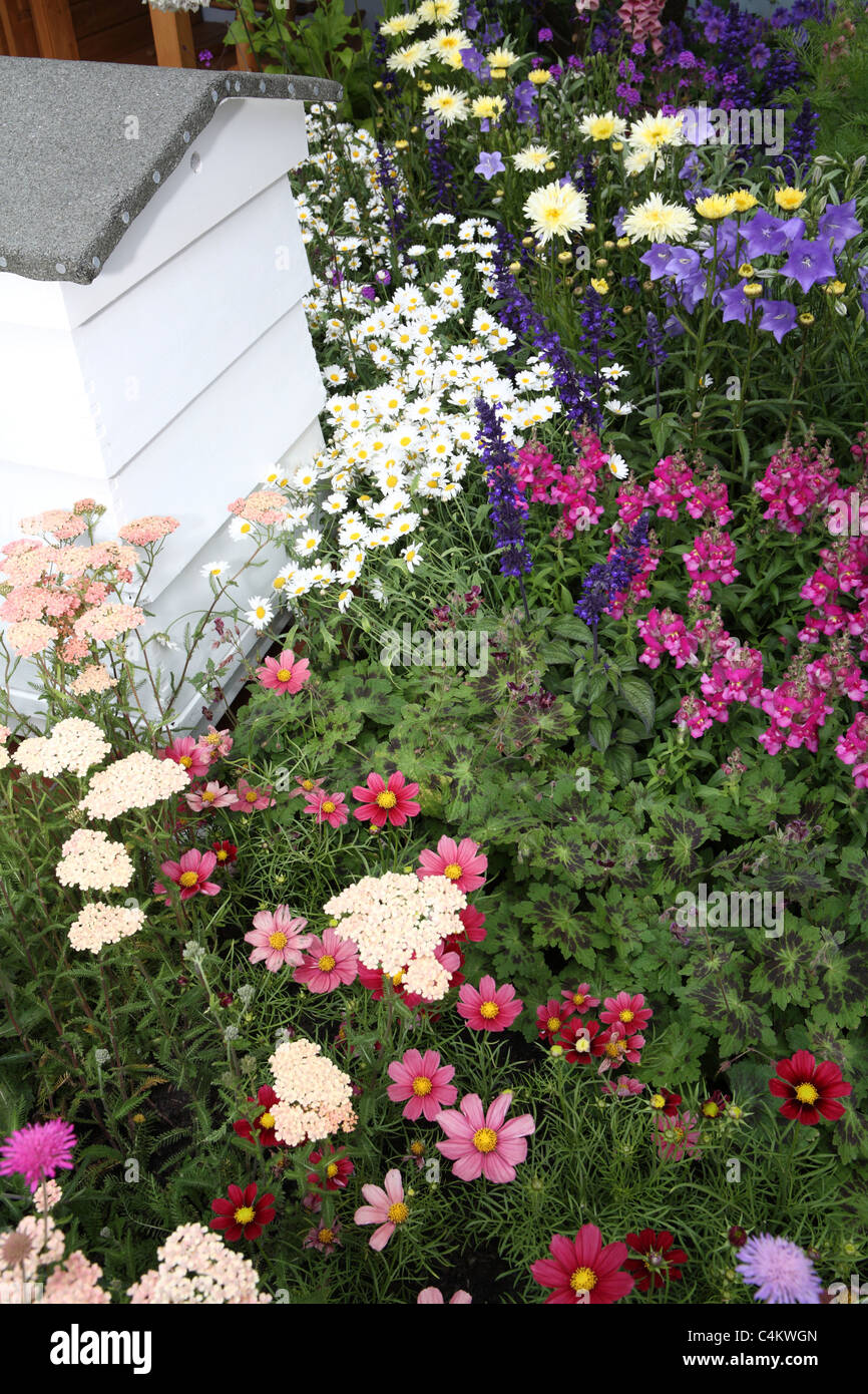 Bee hive in country garden Stock Photo