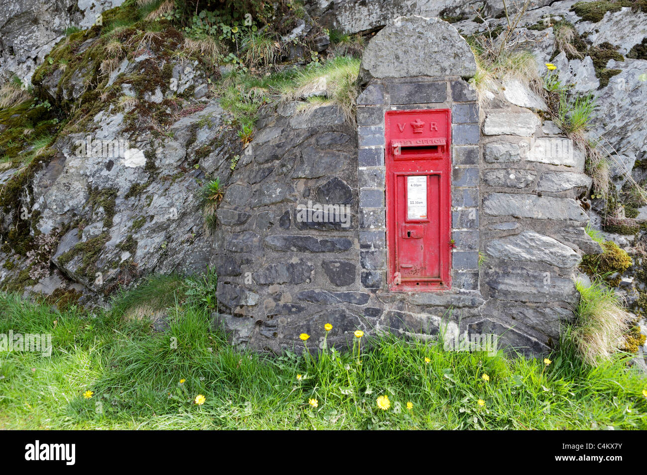 RED LETTER BOX, an relic from the Victorian era, this particular form of letter boxes were to be found in rural and remote areas. Stock Photo