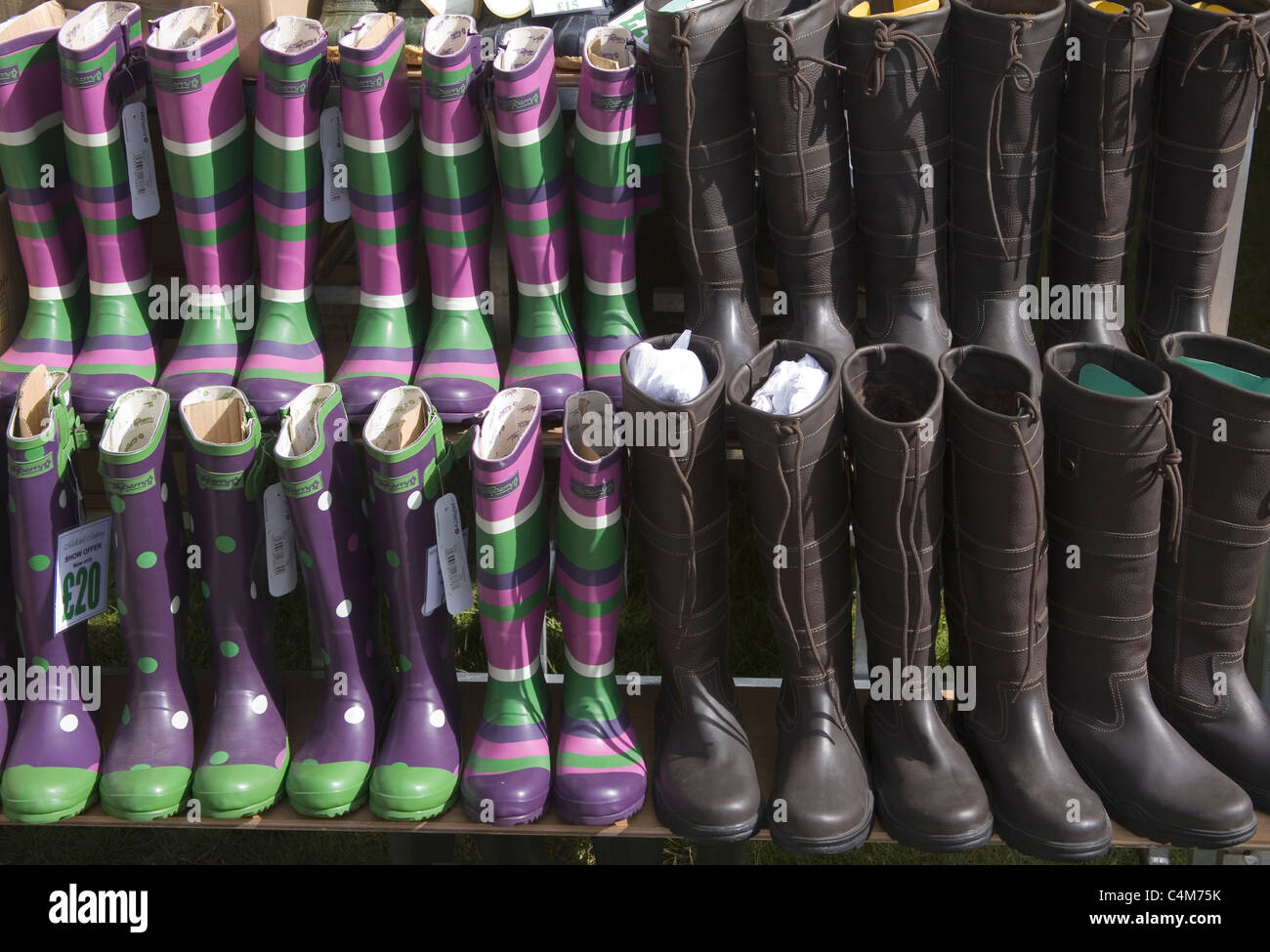 wellington boots for sale at the south of england show Stock Photo Alamy