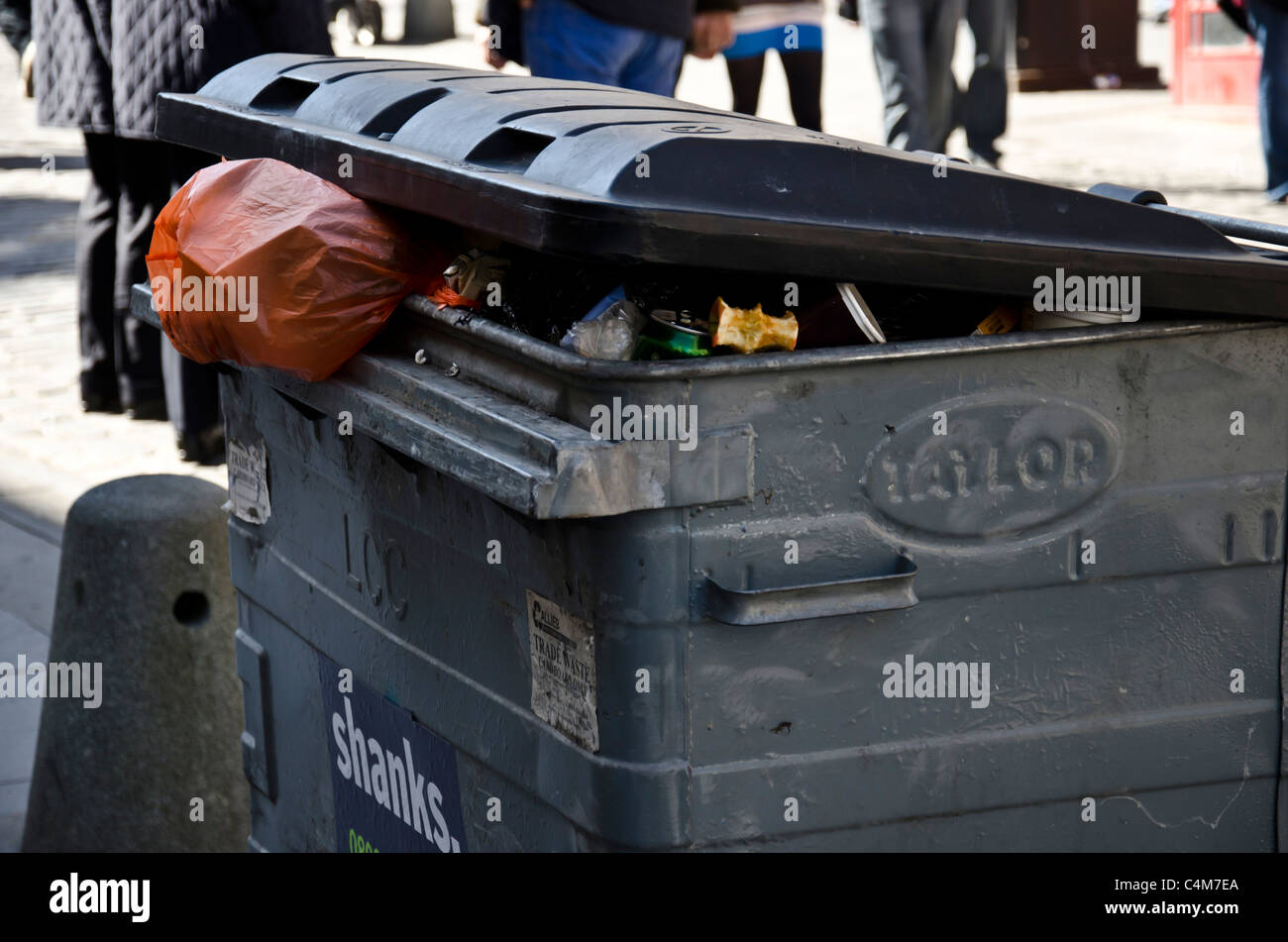 Overflowing rubbish bin in the High Street in Edinburgh City Centre
