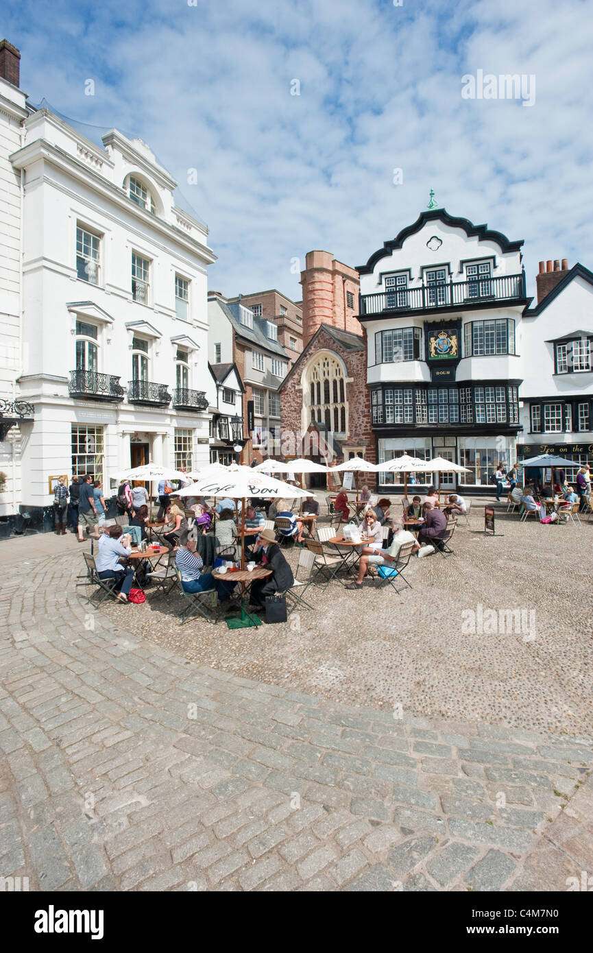 The junction of Cathedral Yard (left) and Cathedral Close (right) where there are many cafes, bars and restaurants in Exeter. Stock Photo