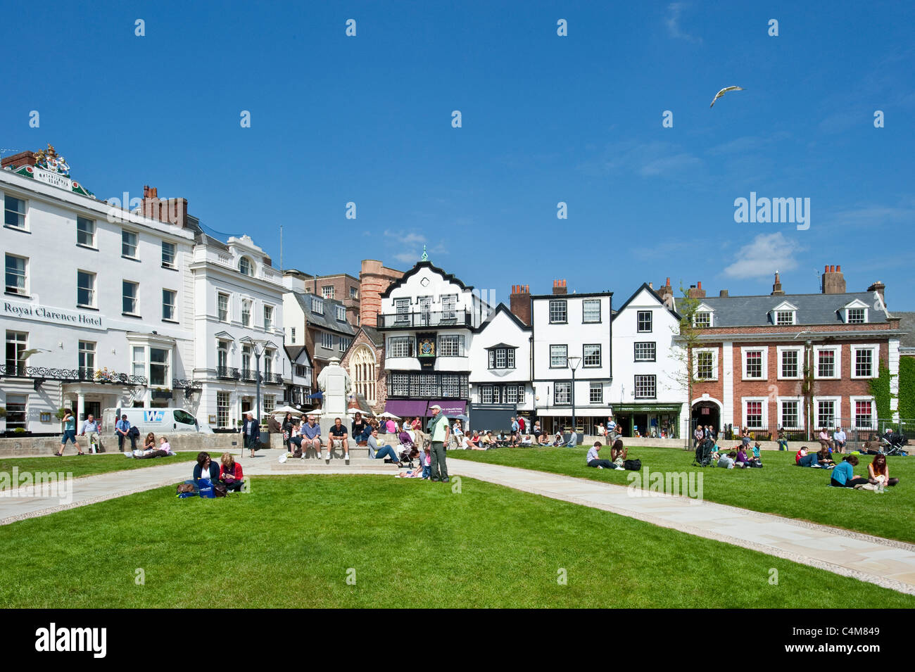The green of Exeter Cathedral where there are many cafes, bars and