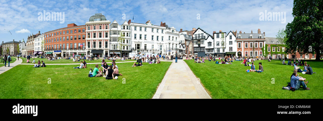 A 3 picture stitch of the green area next to Exeter Cathedral where there are many cafes, bars and restaurants. Stock Photo