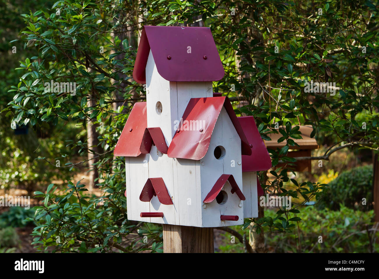Garden birdhouse and landscaping. chriskirkphotography.net Stock Photo