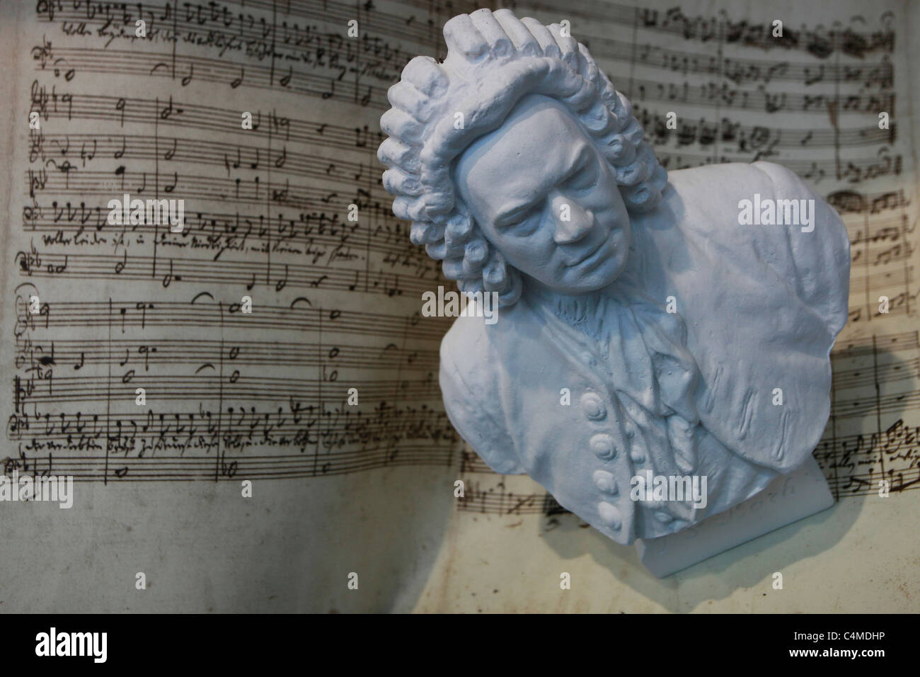 Sculpted bust of the German composer Johann Sebastian Bach displayed in a shop window in Leipzig Saxony Eastern Germany Stock Photo