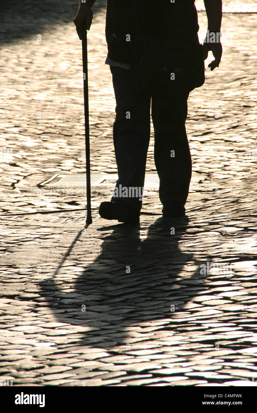 old man with walking stick Stock Photo - Alamy