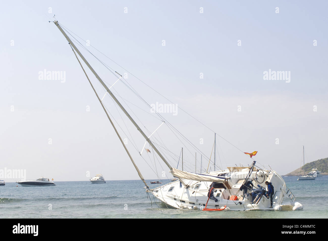 sinking sailboat Stock Photo