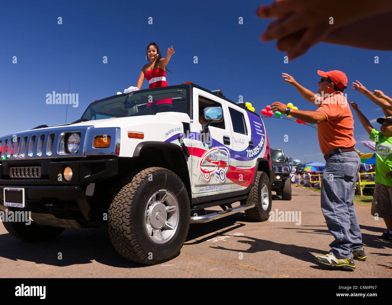 MANASSAS, VIRGINIA, USA - Beauty queen in truck during Bolivian folklife festival parade. Stock Photo