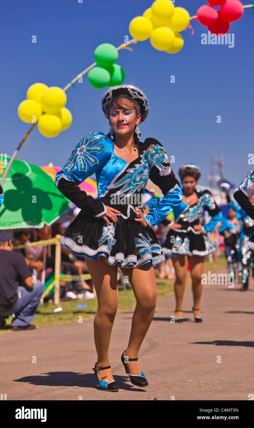 MANASSAS, VIRGINIA, USA - Women in Bolivian folklife festival parade with dancers in costume. Stock Photo