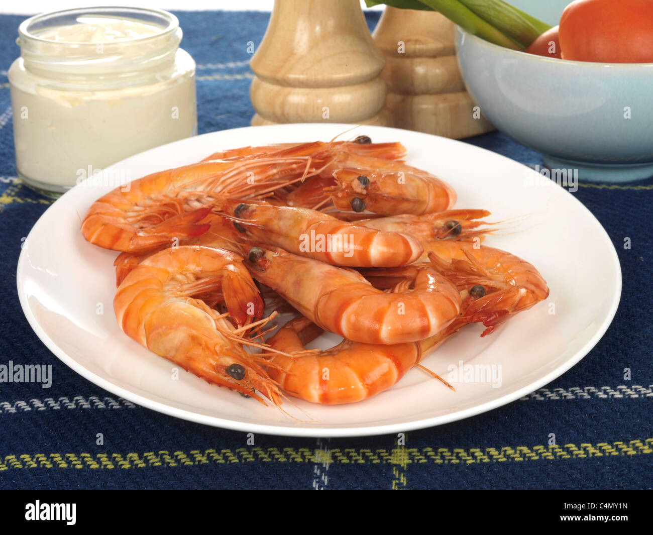 Healthy Fresh Cooked Prawns With Their Shells On In A Bowl With Mayonnaise On A Table Top and No