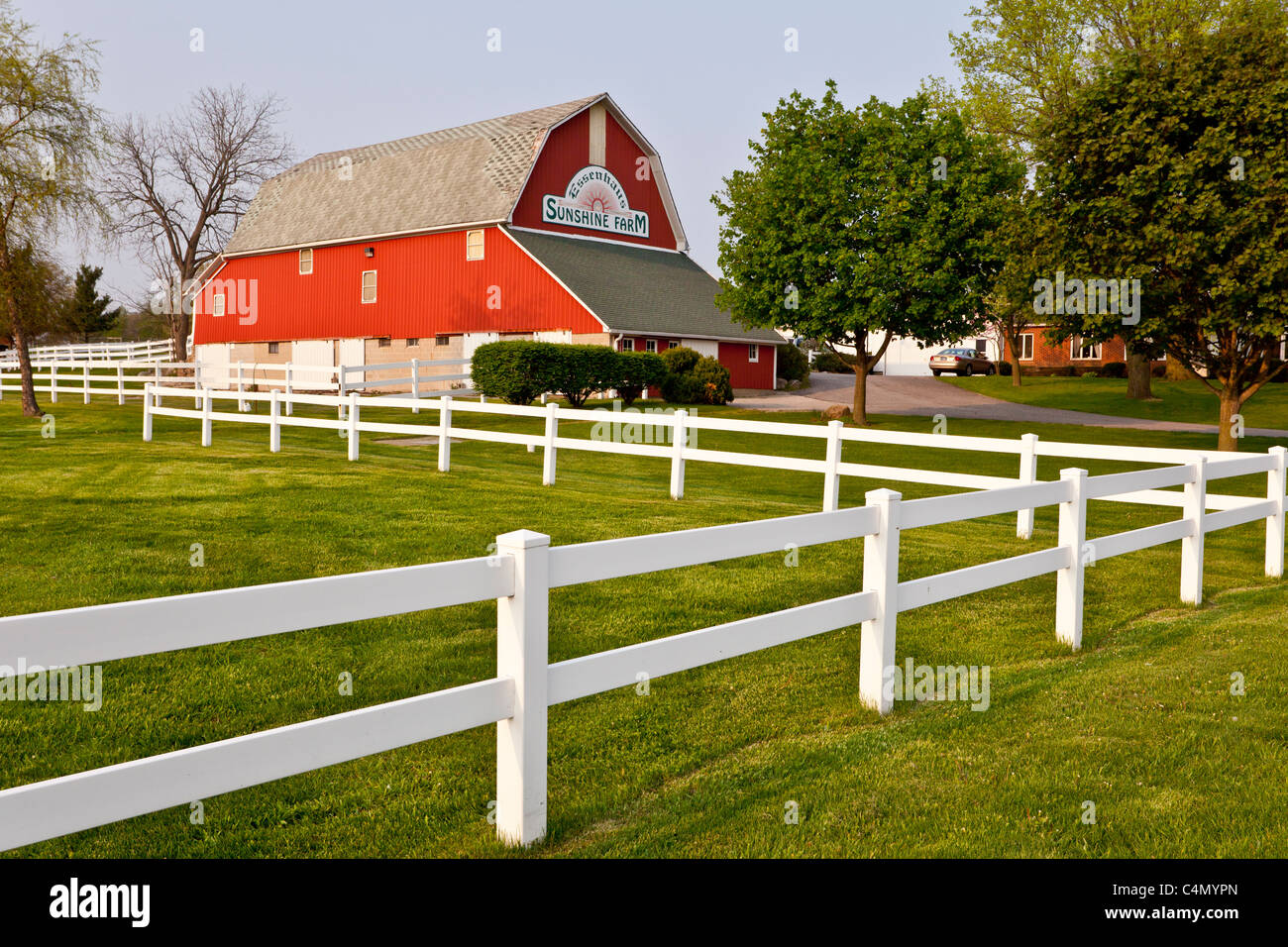 A red barn at the Sunshine Farm and Essenhaus in Middlebury, Indiana, USA. Stock Photo