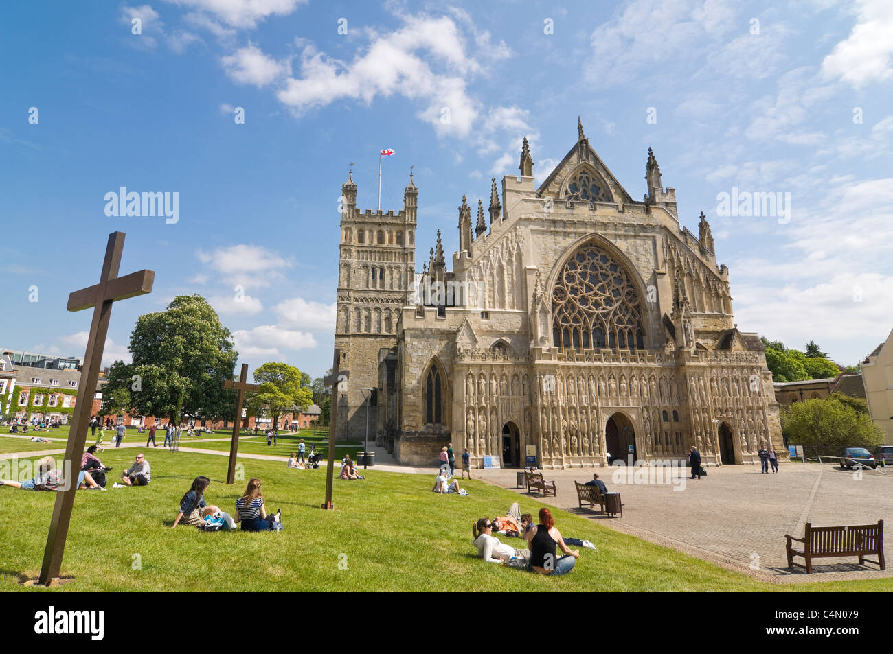 Horizontal wide angle view of Exeter Cathedral and Cathedral Square on a sunny day. Stock Photo