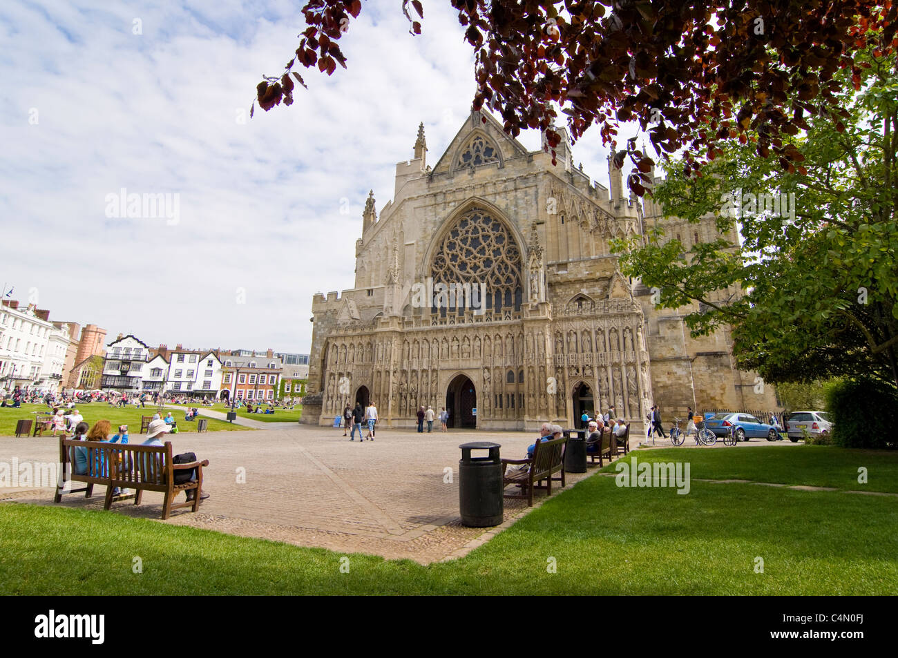 Horizontal wide angle view of Exeter Cathedral and Cathedral Square on a sunny day. Stock Photo