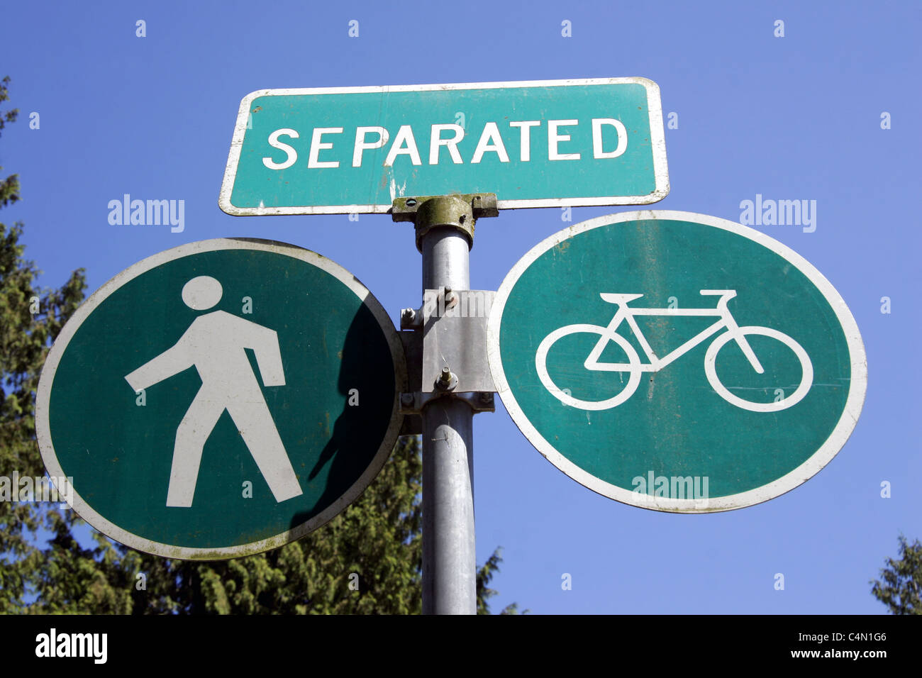 Separated path sign for pedestrians and cyclists Stock Photo