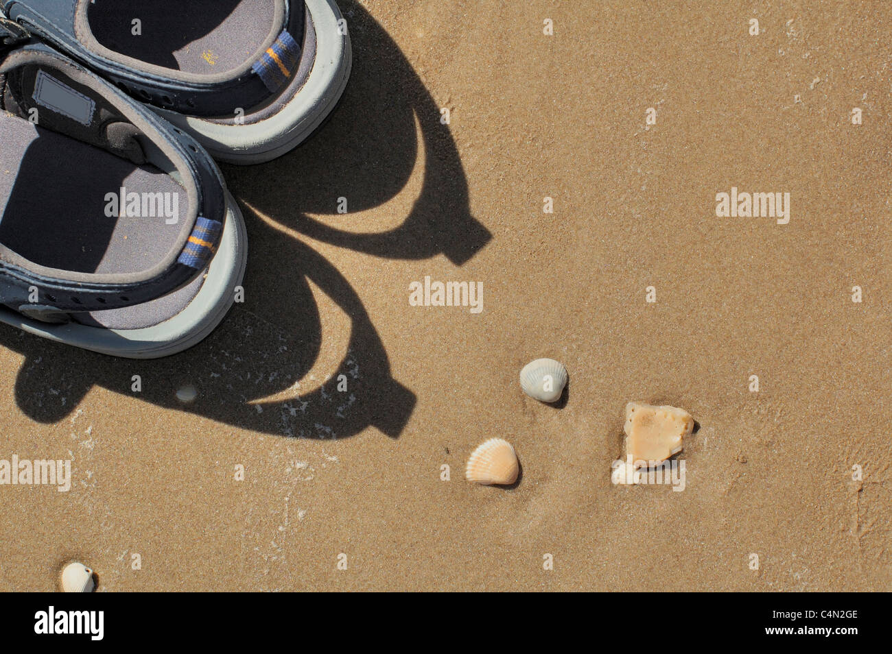 sandals on the beach Stock Photo - Alamy