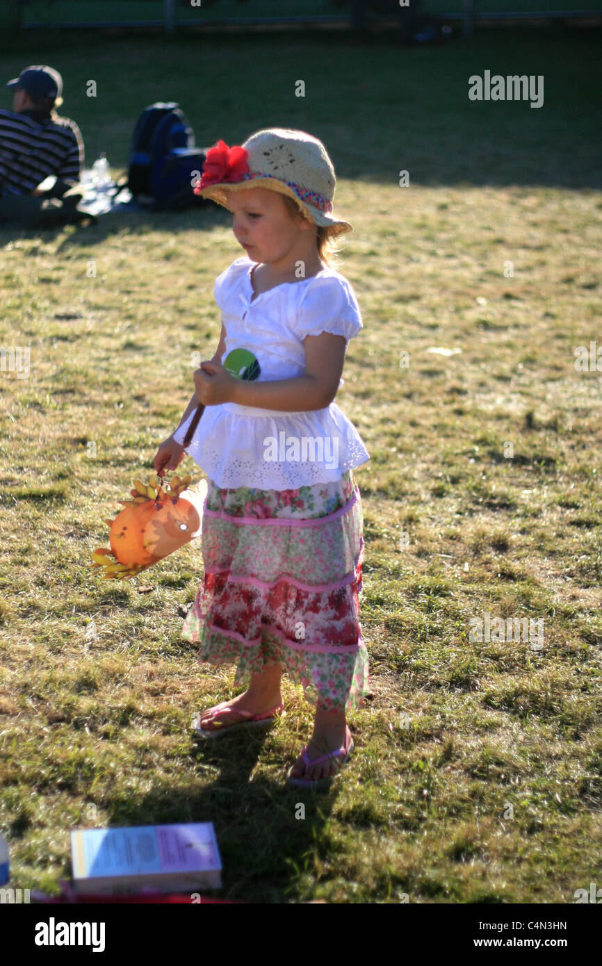 little girl with straw hat, Hay Literary Festival, May 2011 Stock Photo