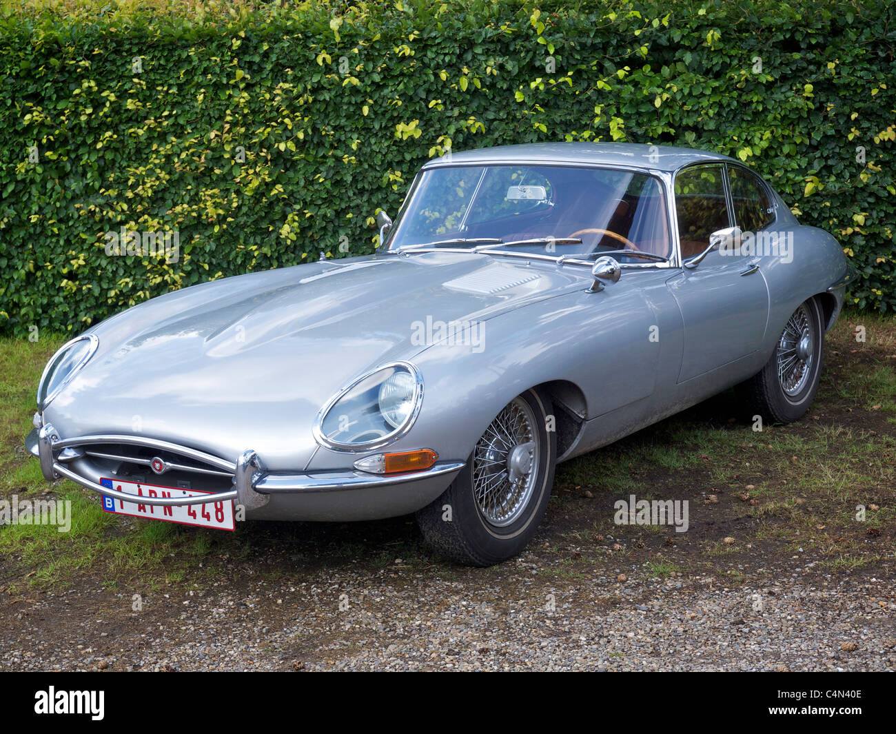 Silver Jaguar E-type 2+2 coupe sportscar with wire wheels Stock Photo