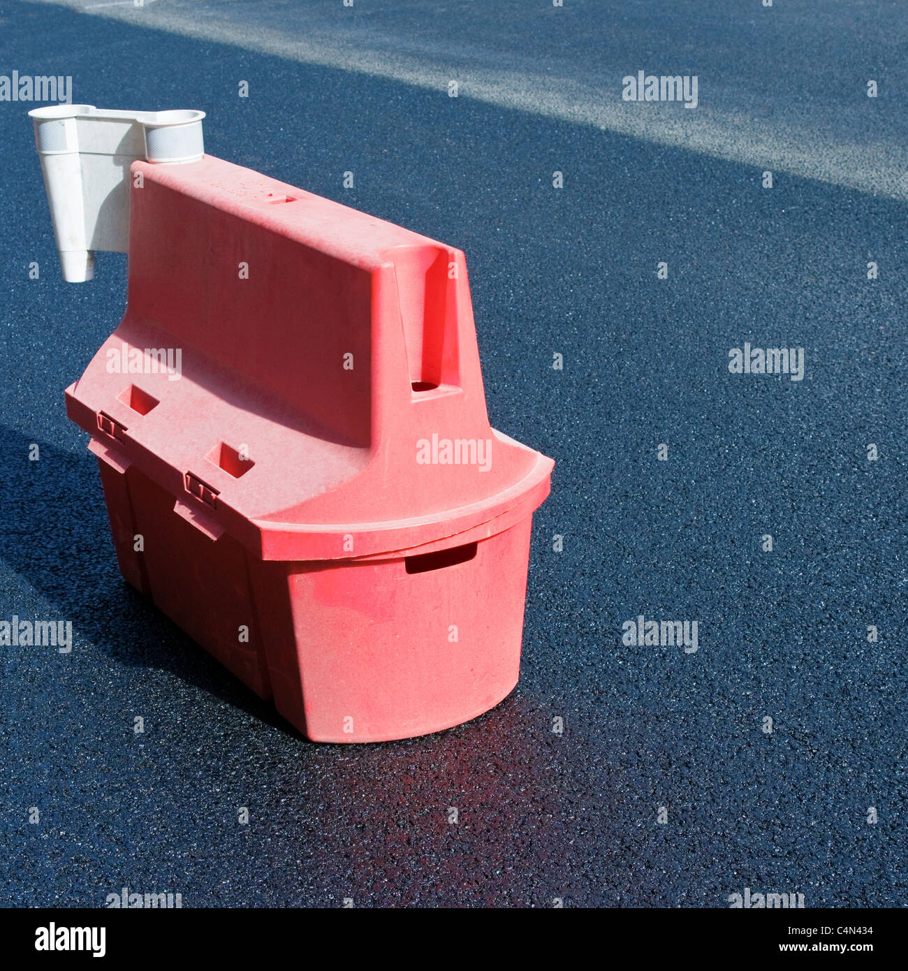 Motorway plastic safety barrier on a newly tarmacked road Stock Photo