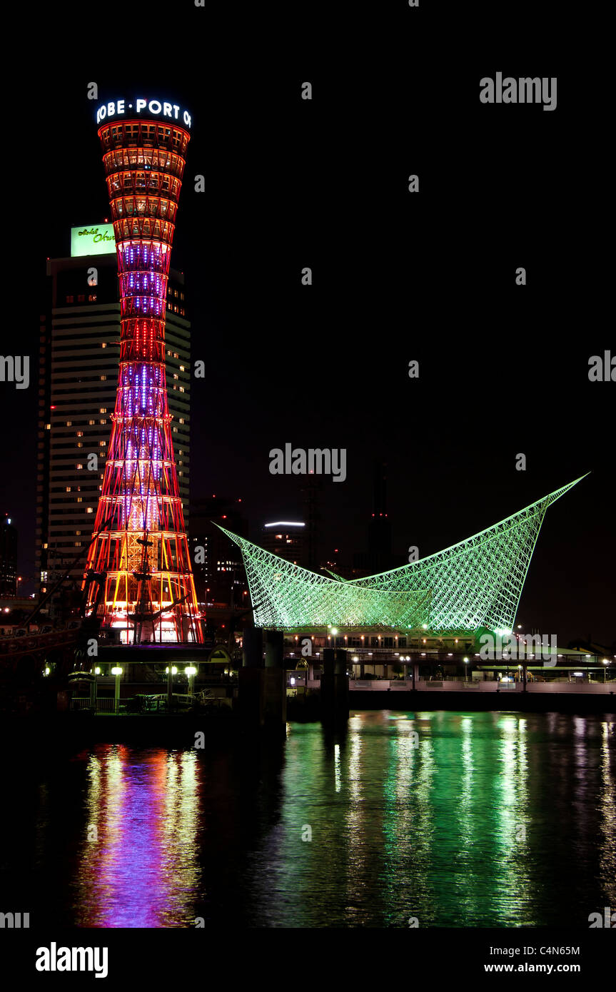 Kobe Port Tower and the Maritime Museum at night in Meriken Park, Hyogo Prefecture, Japan. Stock Photo